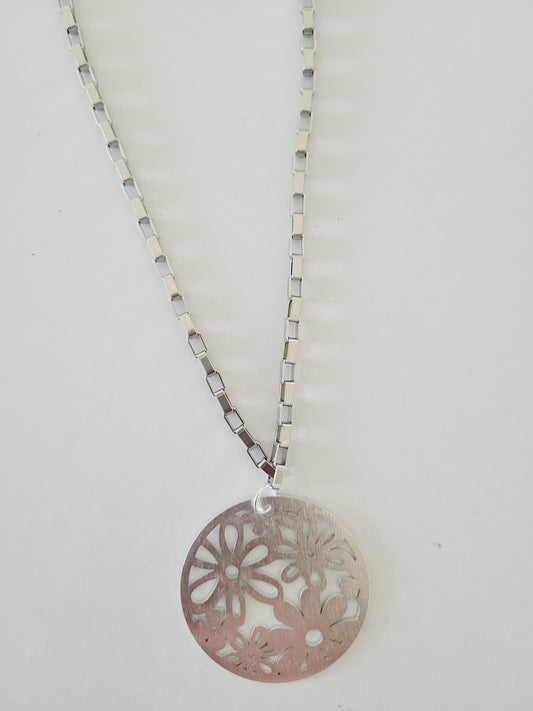 Thick silver chain and variety of pendants