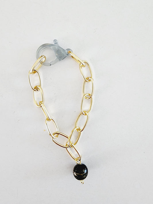 Black ball golden bracelet